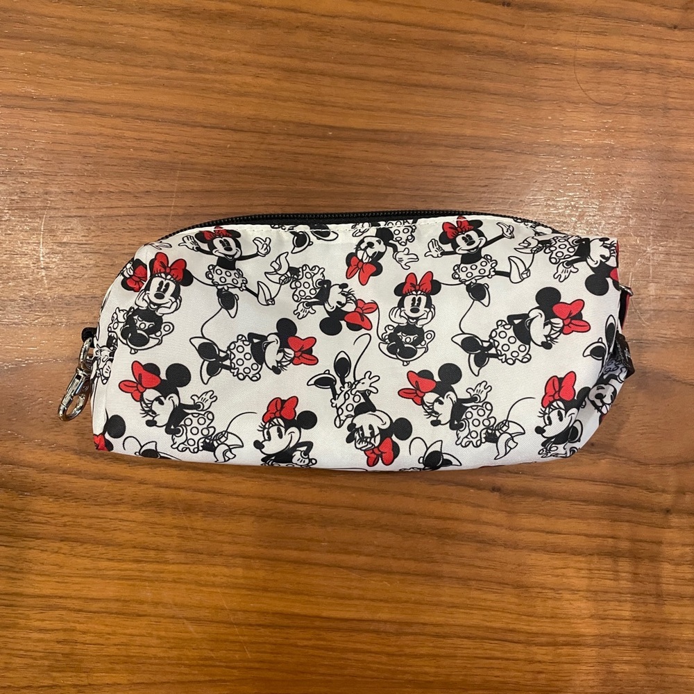 Lined Minnie Mouse themed Petunia Pickle Bottom accessories bag with clip.